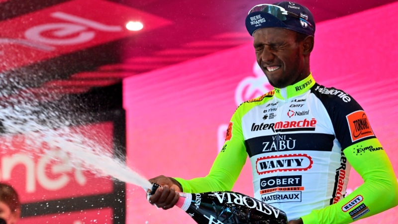 Biniam Girmay celebrates on the podium at the Giro D'Italia in Jesi, Italy, on May 17, 2022. (Massimo Paolone / LaPresse via AP) 