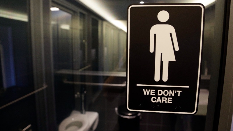 Signage is seen outside a restroom at 21c Museum Hotel in Durham, N.C., on  May 12, 2016. (Gerry Broome / AP) 