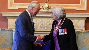 Britain's Prince Charles shakes hands with Canada's Governor General Mary Simon, while attending the Order of Military Merit Investiture Ceremony, on the second day of the Canadian 2022 Royal Tour, in Ottawa on May 18, 2022. (Carlos Osorio/THE CANADIAN PRESS)