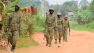 Soldiers patrol in Magere, Kampala, Uganda, on Jan. 16, 2021. (Nicholas Bamulanzeki / AP)