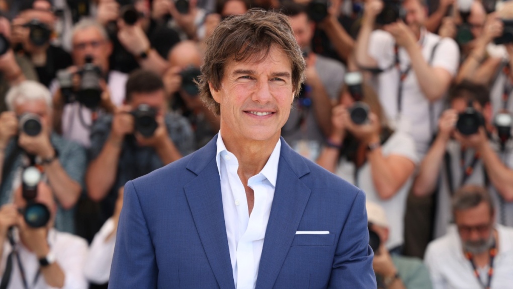 Tom Cruise poses at the 2022 Cannes film fest