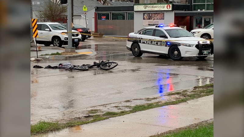 What appears to be clothing and a damaged bicycle are seen at the intersection of Erin Street and Sargent Avenue where police say there was a crash with a garbage truck on May 19, 2022. (Source: Gary Robson/CTV News)