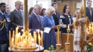 Prince Charles and Camilla, Duchess of Cornwall, take part in a traditional prayer service at a Ukrainian church in Ottawa on their Canadian Royal Tour, Wednesday, May 18, 2022. THE CANADIAN PRESS/Paul Chiasson