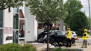 A badly damaged car is seen at the intersection of Park Street and Allen Street in Waterloo. (Tony Grace/CTV Kitchener)