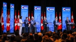 Candidates, left to right, Leslyn Lewis, Roman Baber, Jean Charest, Scott Aitchison, Patrick Brown, and Pierre Poilievre at the Conservative Party of Canada English leadership debate in Edmonton, Alta., Wednesday, May 11, 2022.THE CANADIAN PRESS/Jeff McIntosh