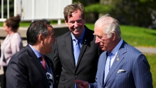 Prince Charles, Prince of Wales, is greeted by John Geiger and Chief Perry Bellegarde in Ottawa on Wednesday, May 18, 2022. THE CANADIAN PRESS/Sean Kilpatrick
