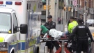 A man is transported to hospital after a suspected drug overdose in downtown London, Ont. (Daryl Newcombe/CTV News London)