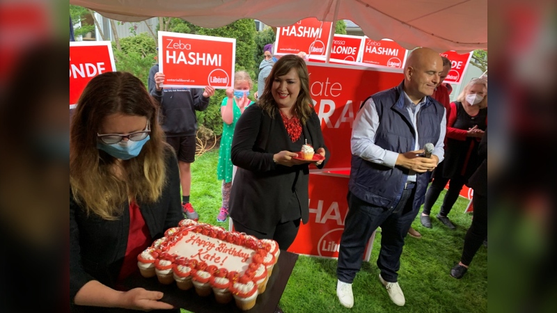 London North Centre Liberal candidate Kate Graham is presented with a birthday cake as Liberal leader Steven Del Duca makes a campaign stop in the riding on May 18, 2022. (Bryan Bicknell/CTV News London)