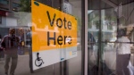 An Elections Ontario sign is seen at University - Rosedale voting location at the Toronto Reference Library on Thursday, June 7, 2018. THE CANADIAN PRESS/Marta Iwanek