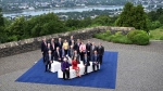 U.S. Treasury Secretary Janet Yellen, front, and participants of a G7 Finance Ministers Meeting pose for a photo at the federal guest house Petersberg, near Bonn, Germany, on May 19, 2022. (Federico Gambarini / dpa via AP) 