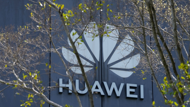 The Huawei brand logo is seen on a building in the sprawling Huawei headquarters campus in Shenzhen, China, Saturday, Sept. 25, 2021. (AP Photo/Ng Han Guan)