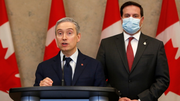 François-Philippe Champagne, Minister of Innovation, Science and Industry, and Marco Mendicino, Minister of Public Safety, hold a press conference to announce that Huawei Technologies will be banned from Canada’s 5G networks, in the West Block of Parliament Hill in Ottawa, Ontario on Thursday, May 19, 2022. THE CANADIAN PRESS/David Kawai