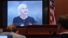 Actor Ellen Barkin testifies in a previously recorded video deposition at the Fairfax County Circuit Courthouse in Fairfax, Va., Thursday, May 19, 2022. (Shawn Thew/Pool Photo via AP)