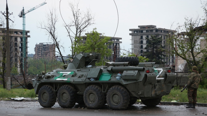 An APC of Donetsk People's Republic militia stands not far from Mariupol's besieged Azovstal steel plant, Thursday, May 19, 2022. (AP Photo)