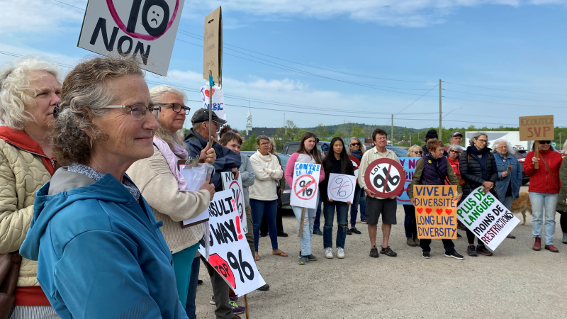 A group of protesters held a rally against Quebec's Bill 96 in Sainte-Cecile-de-Masham, Que., a community north of Ottawa.  (Natalie van Rooy/CTV News Ottawa)