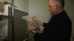 Drug advocate Dana Larsen holds a bag of psilocybin mushrooms. A number of mushroom dispensaries have popped up in the City of Vancouver, similar to cannabis dispensaries before legalization. 