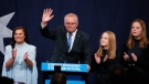 Australian Prime Minister Scott Morrison waves with his wife Jenny and daughter's Lily and Abbey at a Liberal Party function in Sydney, Australia, Saturday, May 21, 2022. (AP Photo/Mark Baker)