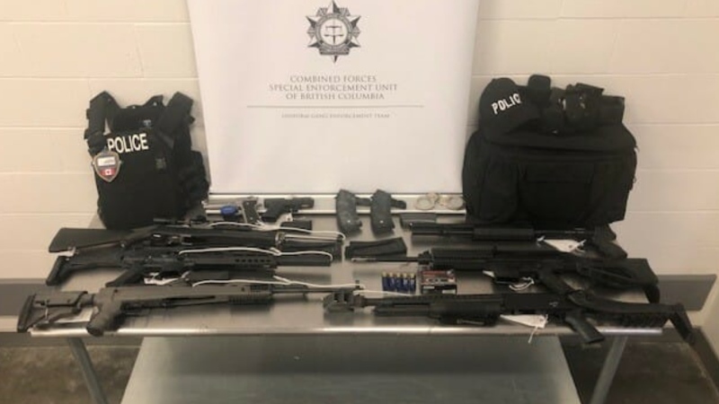 Investigators eventually executed a search warrant at a home and a storage locker, seizing "four long guns, various ammunition, high-capacity magazines and police-related equipment." (CFSEU-BC)