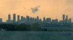 The Toronto skyline is seen amid storm warnings across southern Ontario and parts of Quebec on May 21, 2022.