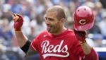 Cincinnati Reds first baseman Joey Votto (19) celebrates his solo home run against the Toronto Blue Jays during eighth inning interleague baseball action in Toronto on Sunday, May 22, 2022. THE CANADIAN PRESS/Frank Gunn