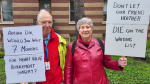 Heather Clarke's friends rally in front of Vancouver's St. Paul's Hospital to protest surgical wait times. 