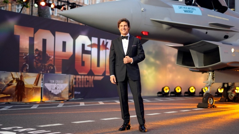 Tom Cruise poses for the media during the 'Top Gun Maverick' U.K. premiere at a central London cinema, on May 19, 2022. (AP Photo/Alberto Pezzali)