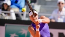 Bianca Andreescu of Canada returns the ball to Iga Swiatek of Poland during their match at the Italian Open tennis tournament, in Rome, Friday, May 13, 2022. (AP Photo/Andrew Medichini)