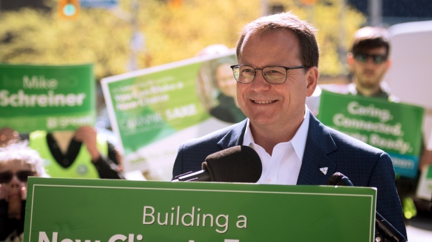 Ontario Green Party Leader Mike Schreiner smiles as supporters clap during a press conference at Bloor-Bedford Parkette in Toronto as part of his campaign tour, on Tuesday, May 17, 2022. THE CANADIAN PRESS/ Tijana Martin 