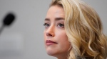Amber Heard listens in the Fairfax County Circuit Courthouse, on May 23, 2022. (Steve Helber / AP) 