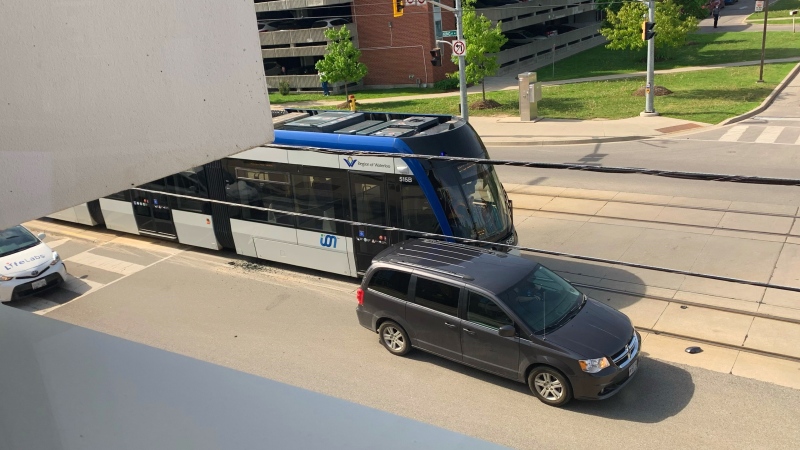 The aftermath of a collision between a van and an LRT train is seen on King Street in Kitchener. (CTV Kitchener)