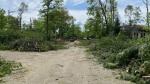Crews continue cleanup efforts in Nepean's Pineglen neighbourhood on Tuesday, May 24, 2022. (Katie Griffin/CTV News Ottawa)