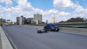 A crash involving a motorcycle and a car closed down part of St. James Bridge on May 24, 2022. (CTV News Photo Dan Timmerman)
