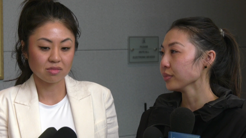 Christina and Angela Trang speak to reporters at Edmonton City Hall on May 24, 2022 (Joe Scarpelli/CTV News Edmonton).