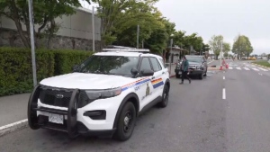 Police vehicles are seen parked outside the Victoria International Airport. May 24, 2022 (CTV News)