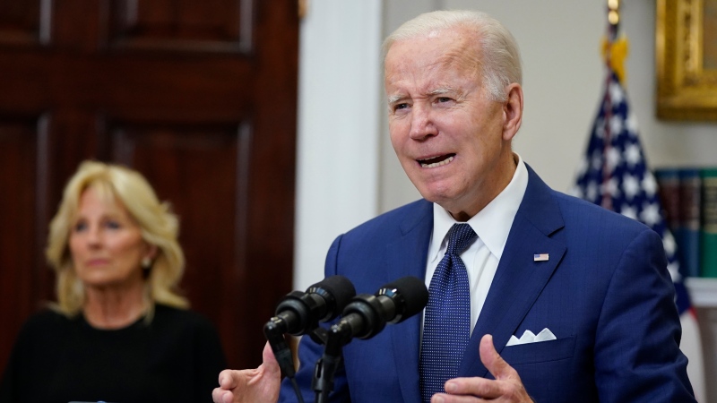 U.S. President Joe Biden speaks to the nation about the mass shooting at Robb Elementary School in Uvalde, Texas, from the White House, in Washington, May 24, 2022, as first lady Jill Biden listens. (AP Photo/Manuel Balce Ceneta)