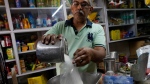 A man packs sugar for a customer in Mumbai, India, on May 25, 2022. (Rajanish kakade / AP) 