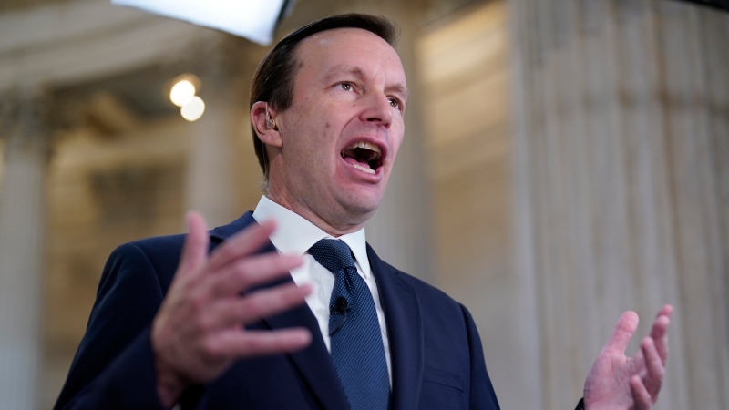 Sen. Chris Murphy, D-Ct., speaks during a morning television interview, Wednesday, May 25, 2022 on Capitol Hill in Washington. Murphy took to the Senate floor Tuesday and demanded that lawmakers accomplish what they failed to do after 20 children, mostly 6 or 7 years old, and six educators in Newtown, Connecticut died on Dec. 14, 2012. (AP Photo/J. Scott Applewhite)