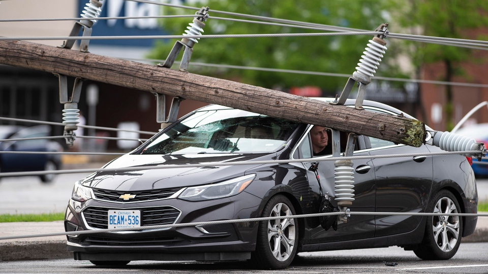Utility pole, hydro lines down on Merivale Road