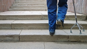 A person walks up a set of stairs in this undated stock image. (Shutterstock)