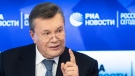 Former Ukraine President Viktor Yanukovych speaks during a news conference in Moscow, Russia on Feb. 6, 2019. (AP Photo/Pavel Golovkin)