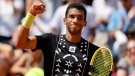 Canada's Felix Auger-Aliassime clenches his fist after defeating Argentina's Camilo Ugo Carabelli during their second round match of the French Open tennis tournament in Paris, on May 25, 2022. (Jean-Francois Badias / AP)