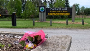 A bouquet of flowers sits outside Pinehurst Lake Conservation Area in Ayr on Tuesday May 24. (Jeff Pickel/CTV Kitchener)