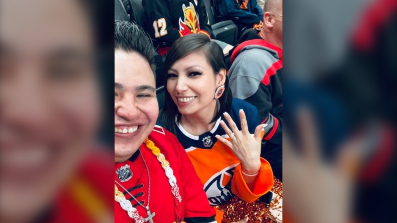 Tessa Monias and Payden Partaker got engaged at Tuesday night's Battle of Alberta hockey game. (Source: Tessa Monias)