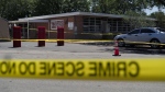 Crime scene tape surrounds Robb Elementary School in Uvalde, Texas, May 25, 2022. (AP Photo/Jae C. Hong)