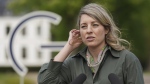 Melanie Joly, Foreign Minister of Canada, addresses the media during a statement as part of the meeting of foreign ministers of the G7 Group of leading democratic economic powers at the Weissenhaus resort in Weissenhaeuser Strand, Germany, May 14, 2022. THE CANADIA PRESS/AP-Marcus Brandt/Pool via AP