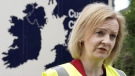 British Foreign Secretary Liz Truss speaks during a visit to McCulla Haulage to discuss the Northern Ireland protocol with businesses, in Lisburn, Northern Ireland, May 25, 2022. THE CANADIAN PRESS/AP-Niall Carson/PA via AP