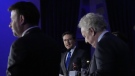 Candidates Roman Baber, left, Pierre Poilievre and Jean Charest, right, take part in the French-language Conservative leadership debate, May 25, 2022 in Laval, Que. THE CANADIAN PRESS/Ryan Remiorz