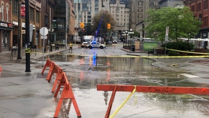 A stretch of George Street in the ByWard Market was closed Thursday morning for a water main break. (CTV News Ottawa)