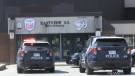 Barrie Police officers investigate a threat at Eastview Secondary School on Tuesday, May 24, 2022. (Kent Colby/CTV News)