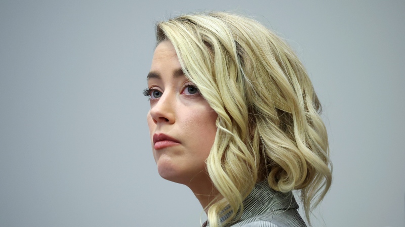Actor Amber Heard appears in the courtroom in the Fairfax County Circuit Courthouse in Fairfax, Va., Thursday, May 26, 2022. (Michael Reynolds/Pool Photo via AP)